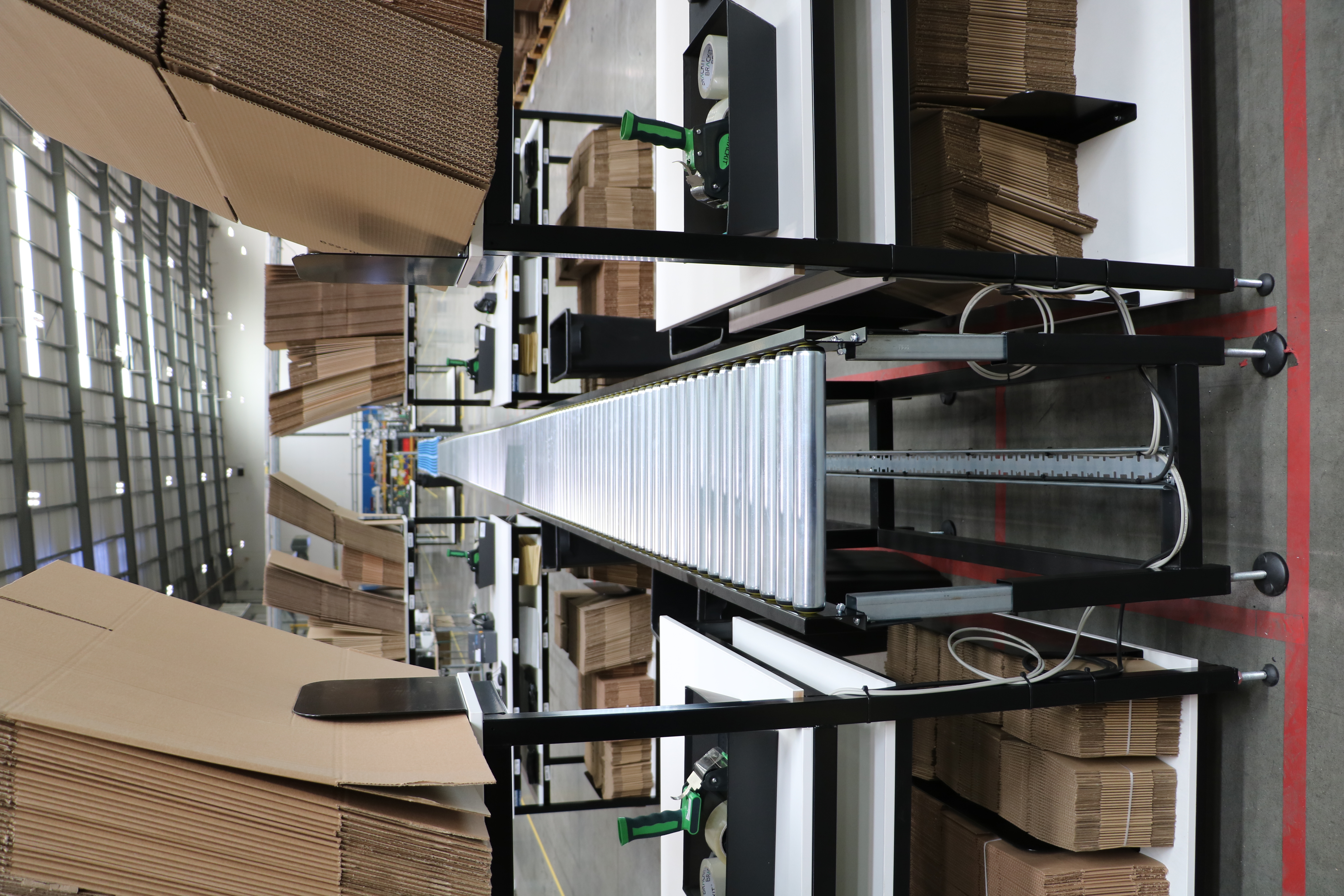 Ecommerce fulfilment conveyor belt system at Launch Fulfilment UK warehouse in Seaham